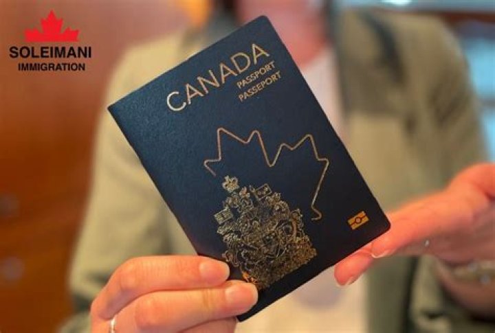 Can I hold US and Canada passport?