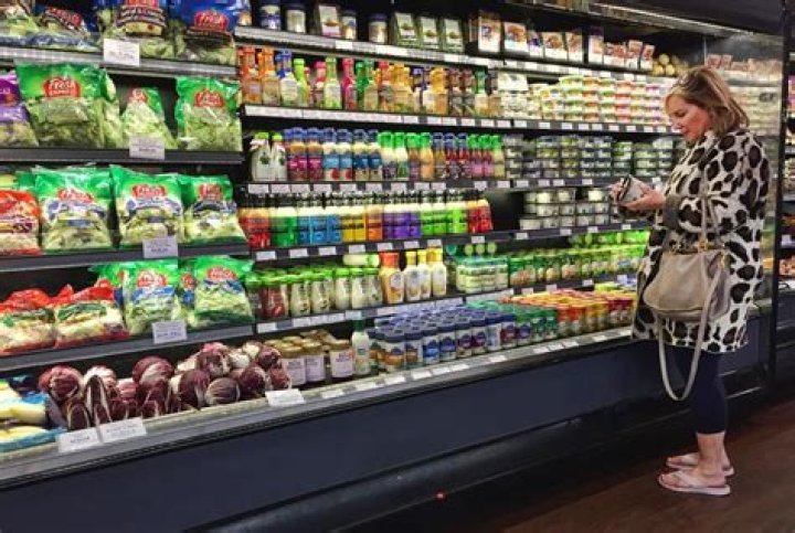 How do grocery stores attract customers?