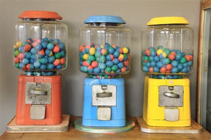 How do you get the coins out of the gumball machine?