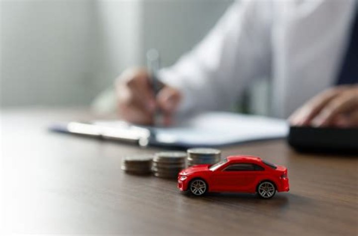 How long should I wait to refinance my car after Chapter 7?