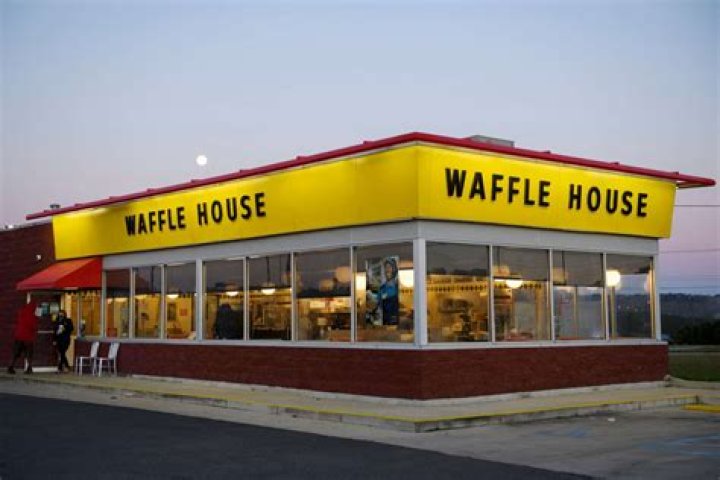 What corporation owns Waffle House?