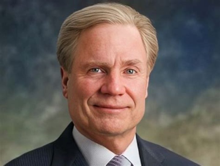 Who is the CEO of Capital One Auto Finance?