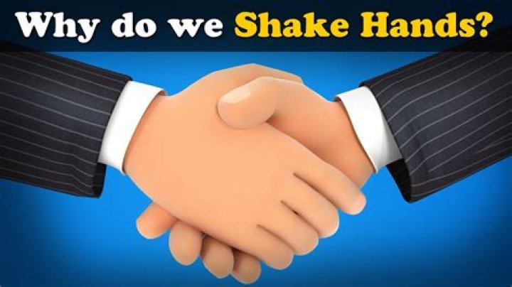Why do we shake hands with our right hand?